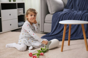 Girl with broken vase